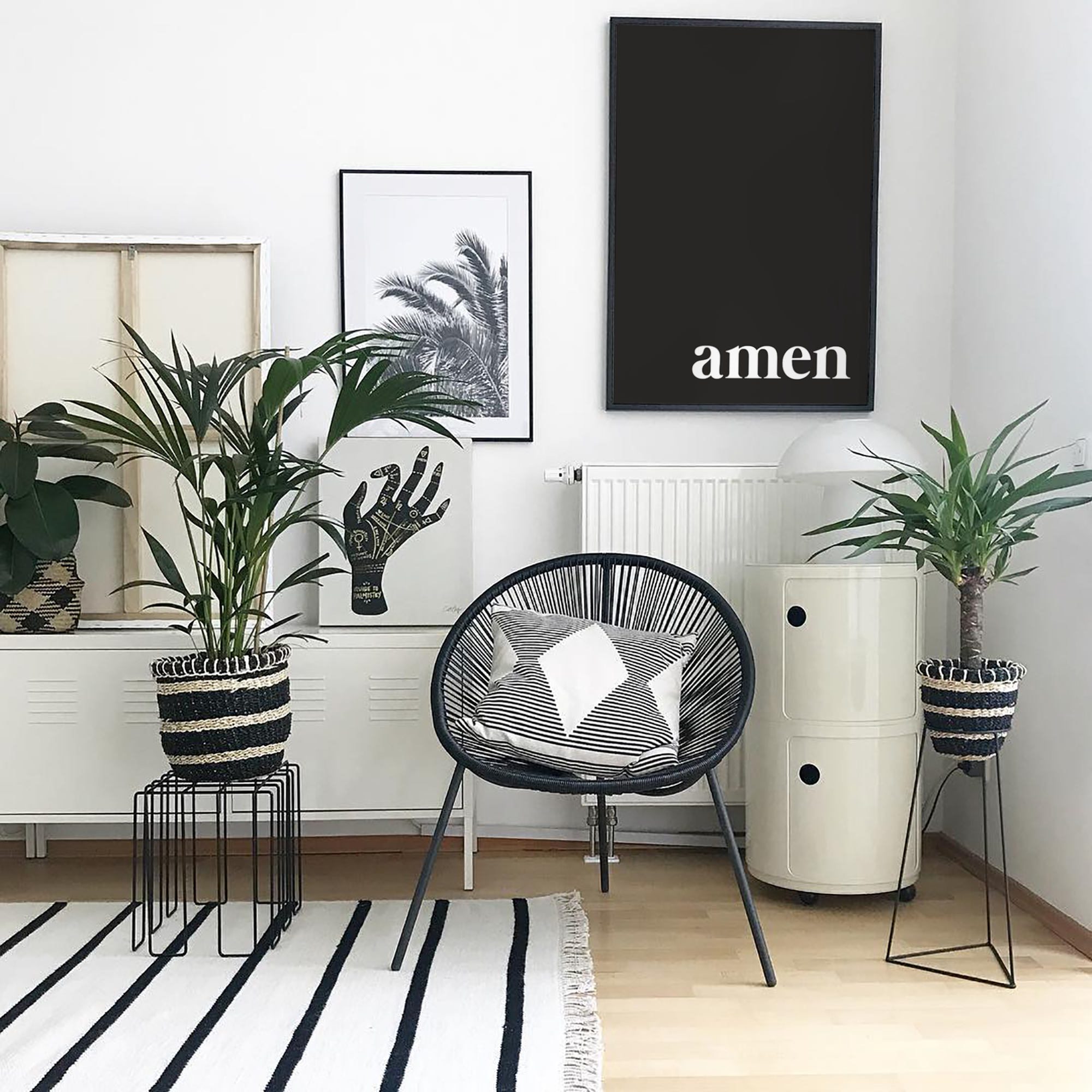 A black print that has the word Amen written in white text. This poster is a reminder that when God gives you a word it is the final say. It is so.