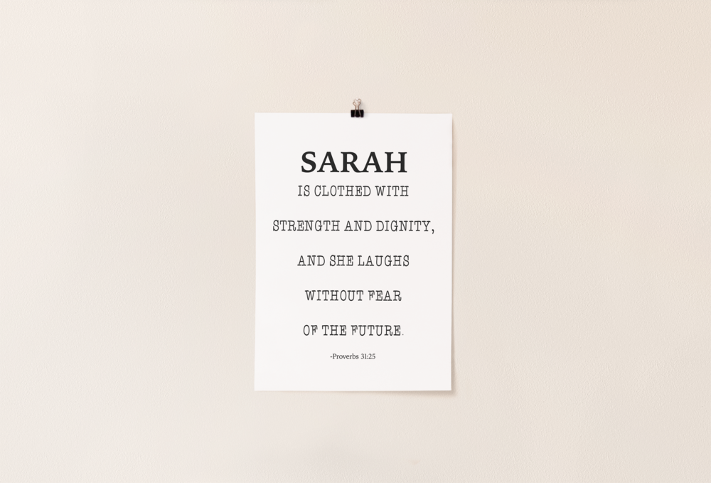 A poster of the scripture proverbs 31:25, hanging on the wall