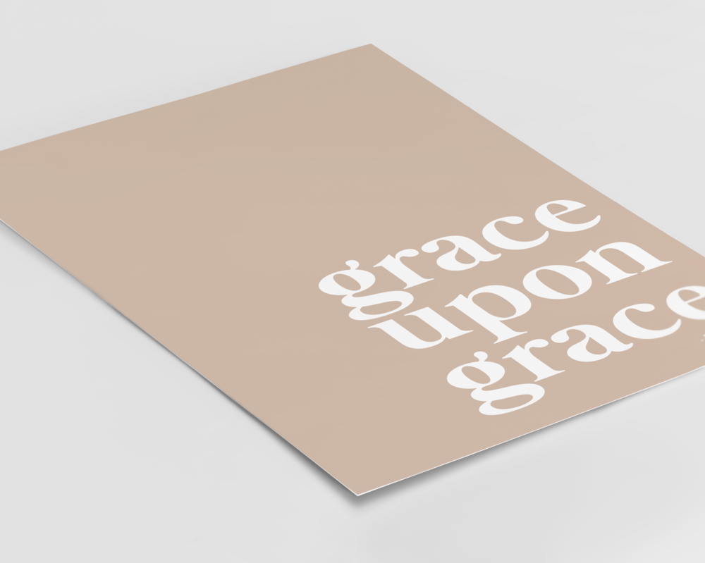 A christian wall art with the words grace upon grace, written in white