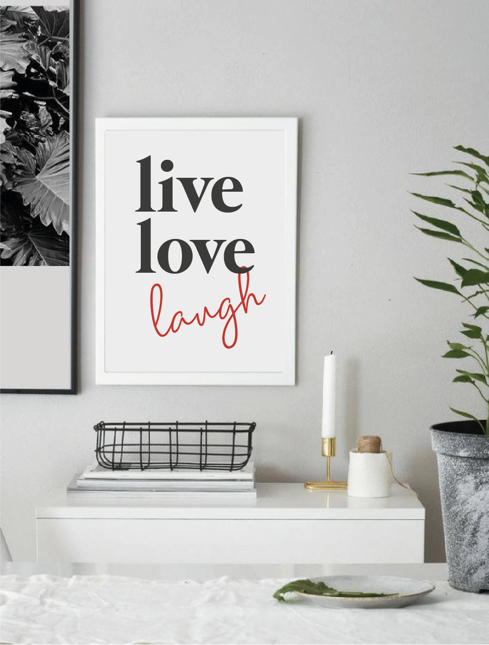 A poster with the words live love laugh in a white frame